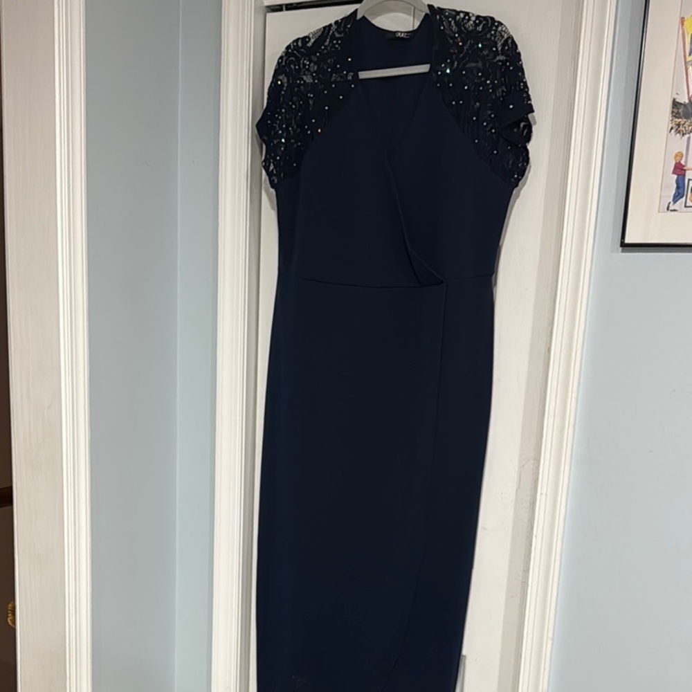 Elegant Navy Blue Dress with Embellished Sleeves